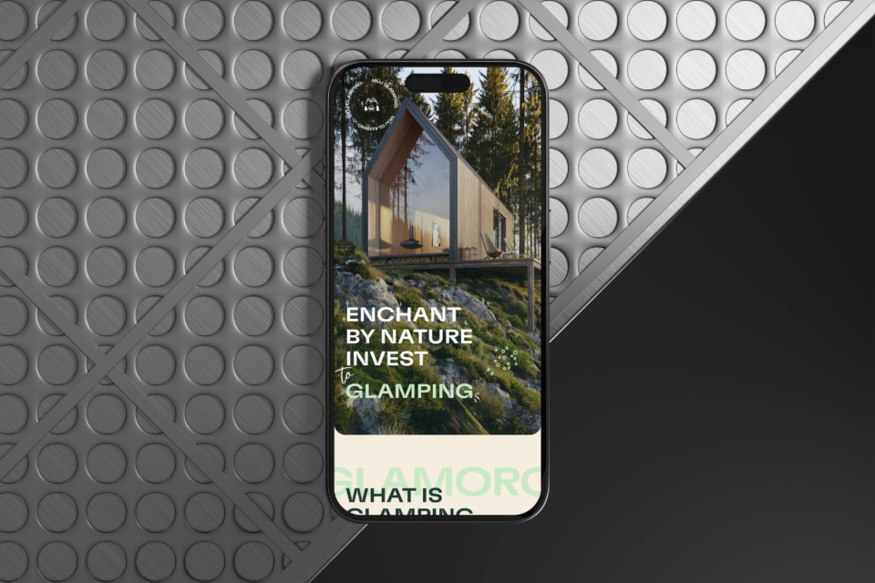 Mobile phone showing a website about investing in glamping