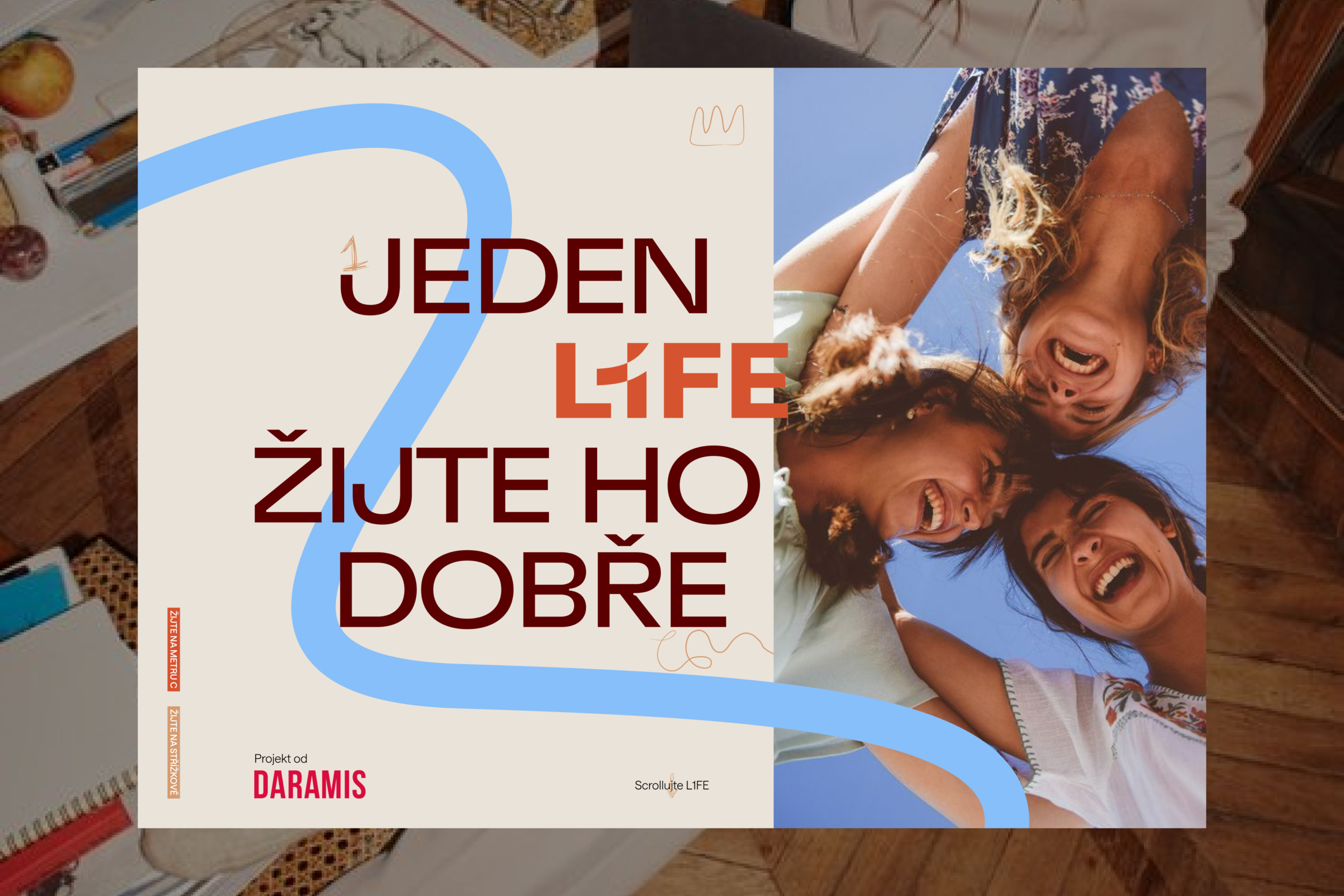 People are laughing and having fun outdoors under a blue sky, with the slogan “One Life—Live It Well” on a poster for a Daramis project focused on a high-quality lifestyle